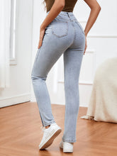 Light Washed Split Hem Jeans